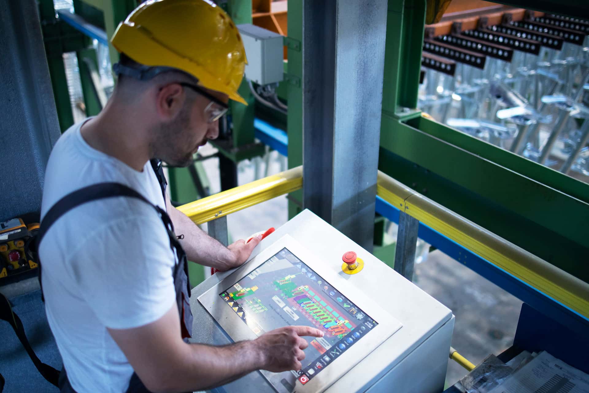 factory-worker-monitoring-industrial-machines-production-remotely-control-room